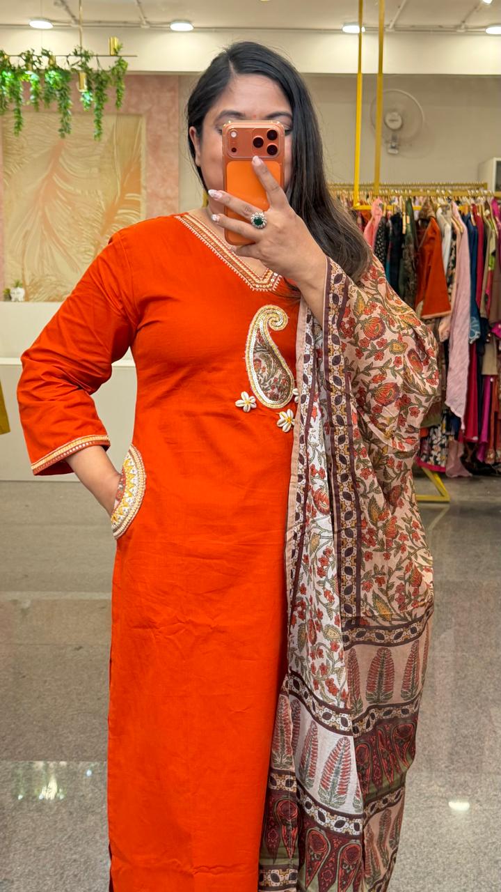 Super smart applique work with designer pockets suit in orange paired Kalamkari dupatta