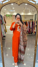 Super smart applique work with designer pockets suit in orange paired Kalamkari dupatta