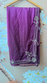 Pretty handwork on blouse and saree in wine