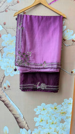 Pretty handwork on blouse and saree in wine
