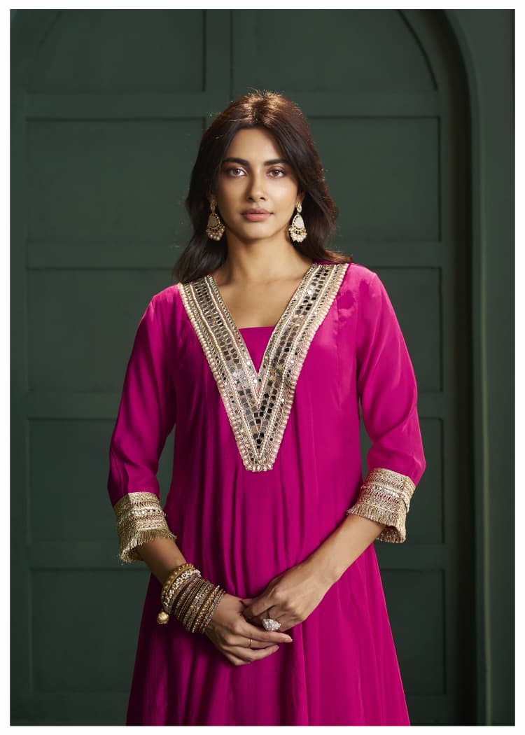 Rani pink lace detailing suit set paired with Banarasi dupatta