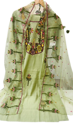 Muslin embroidered suit paired with orgenza dupatta
