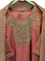 Pretty tissue with Banarasi dupatta and heavy handwork in peach