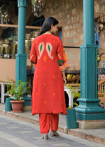 Pure crepe Ikkat print suit set in orange