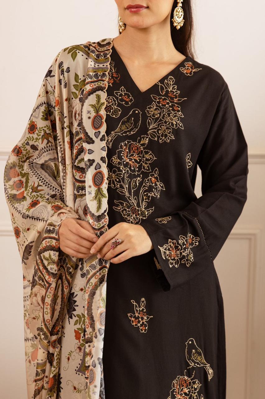 Heavy rayon embroidered suit set paired with soft orgenza dupatta in black