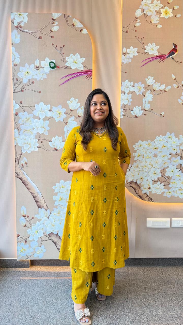 Pretty cotton Ikkat printed V neck plazzo pant suit set in yellow