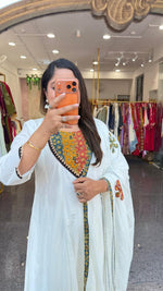 Mul Mul cotton lining applique work full suit set in green. Kurta has pocket too