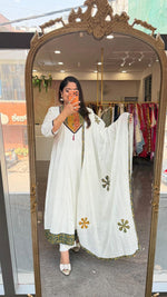 Mul Mul cotton lining applique work full suit set in green. Kurta has pocket too