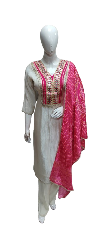 Pretty tissue suit set paired with pink bandhani dupatta