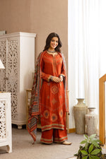 Heavy German rayon suit set paired with kalamkari dupatta in rust fully embroidered