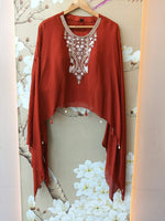 Pretty chinon hand word kaftan paired with brocade plazzo pants in orange
