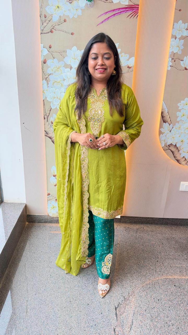 Designer suit set in soft silk fabric true to size in green paired with organza dupatta n zari detailing