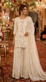 Heavily embroidered premium chinon palzzo set in ivory