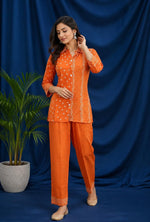 Pretty crepe bandhani co ord in orange