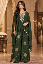 Pretty chinon hand word kaftan paired with brocade plazzo pants in green