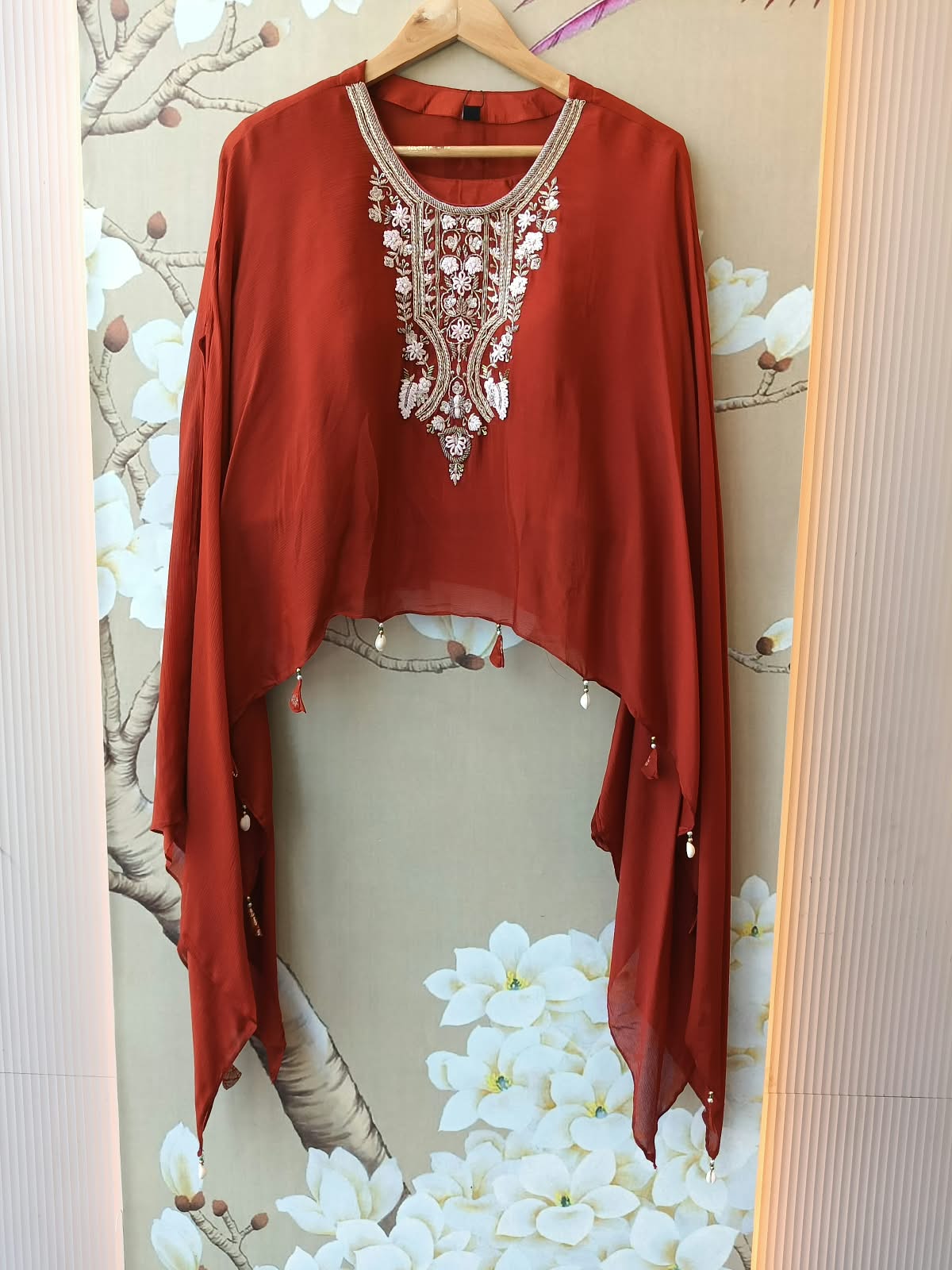 Pretty chinon hand word kaftan paired with brocade plazzo pants in orange
