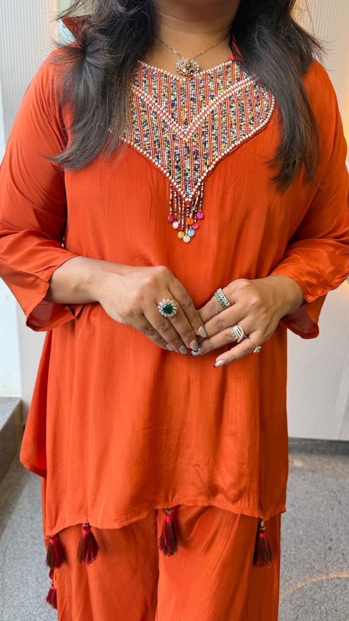 Pure crepe designer Co ord in orange