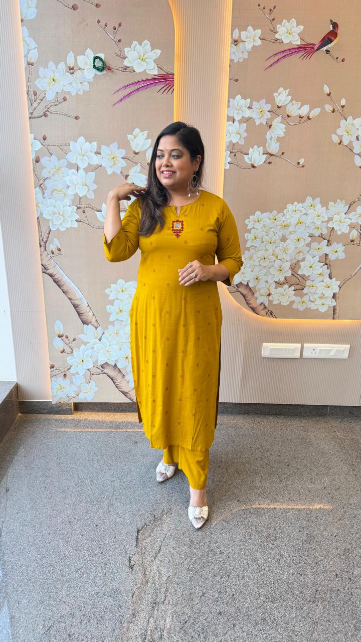 Pretty cotton embroidered kurta pant with mirror work in yellow