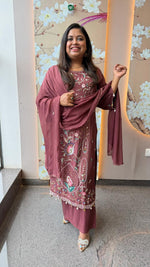 Pretty hand work dola silk suit set with pearl detailing and heavy handwork in wine