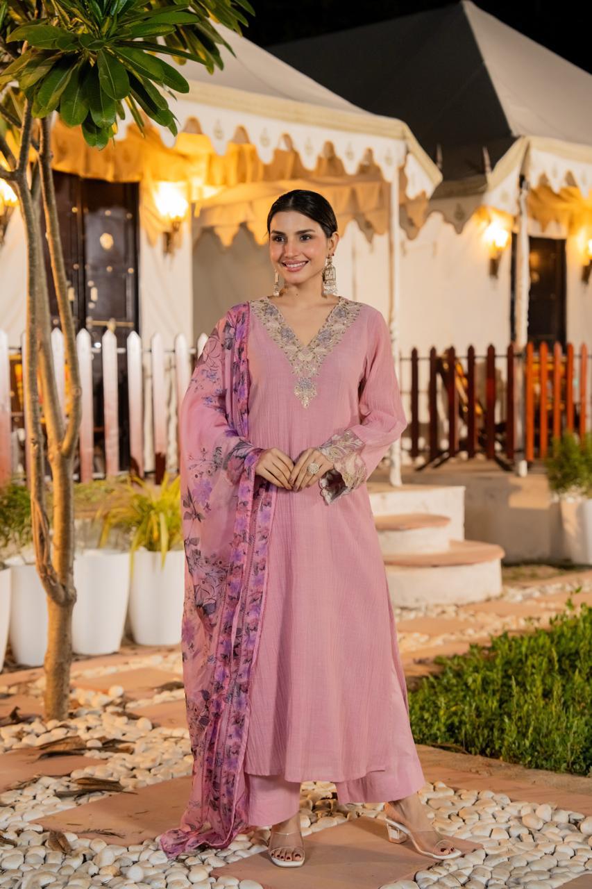Stylish crush cotton designer suit set in yellow paired with a Kalamkari dupatta in pink