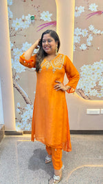 Pure orgenza with pretty handwork kurta pant in orange comes with Banarasi inner