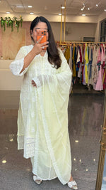 Mind blowing Mul cotton chikankari full suit set in mint yellow