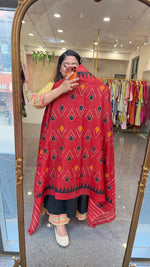 Black Cotton suit set paired with Ikkat dupatta in red
