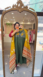 Premium cotton applique work cotton suit in green with pocket and paired with a Kalamkari dupatta