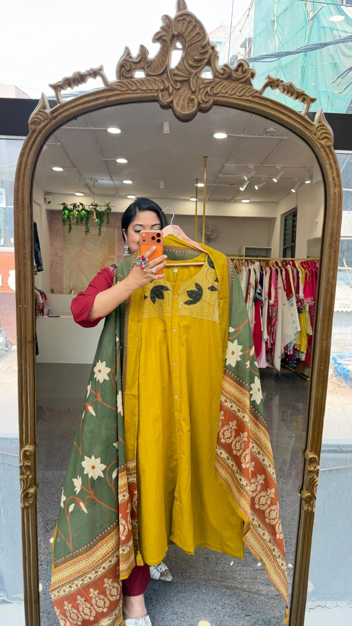 Premium cotton applique work cotton suit in yellow with pocket and paired with a Kalamkari dupatta